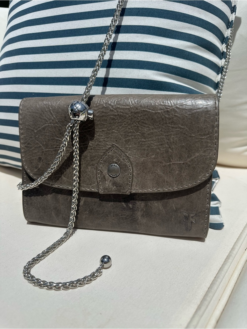 FRYE Grey Leather cross body with adjustable silver colored chain.